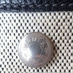 Sac Hermès Garden Party en toile beige et cuir noir seconde main