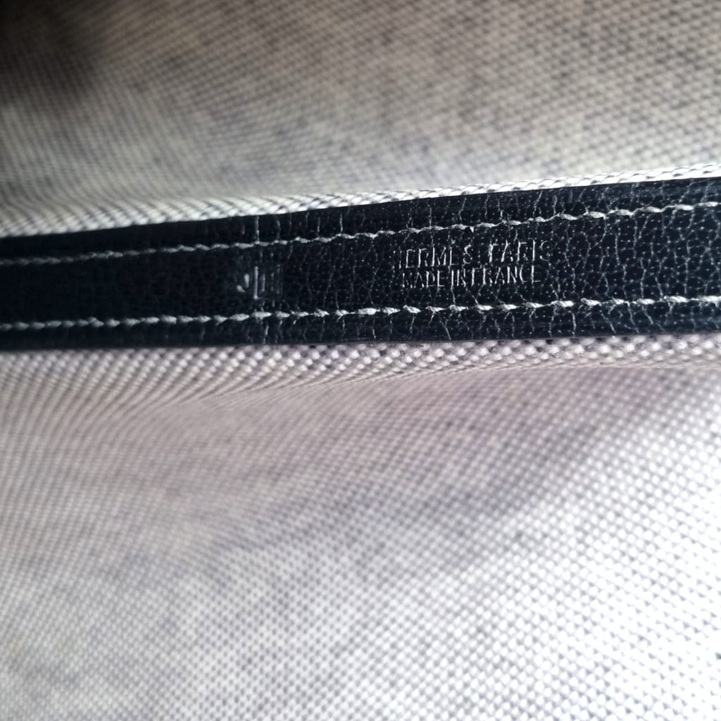 Sac Hermès Garden Party en toile beige et cuir noir seconde main