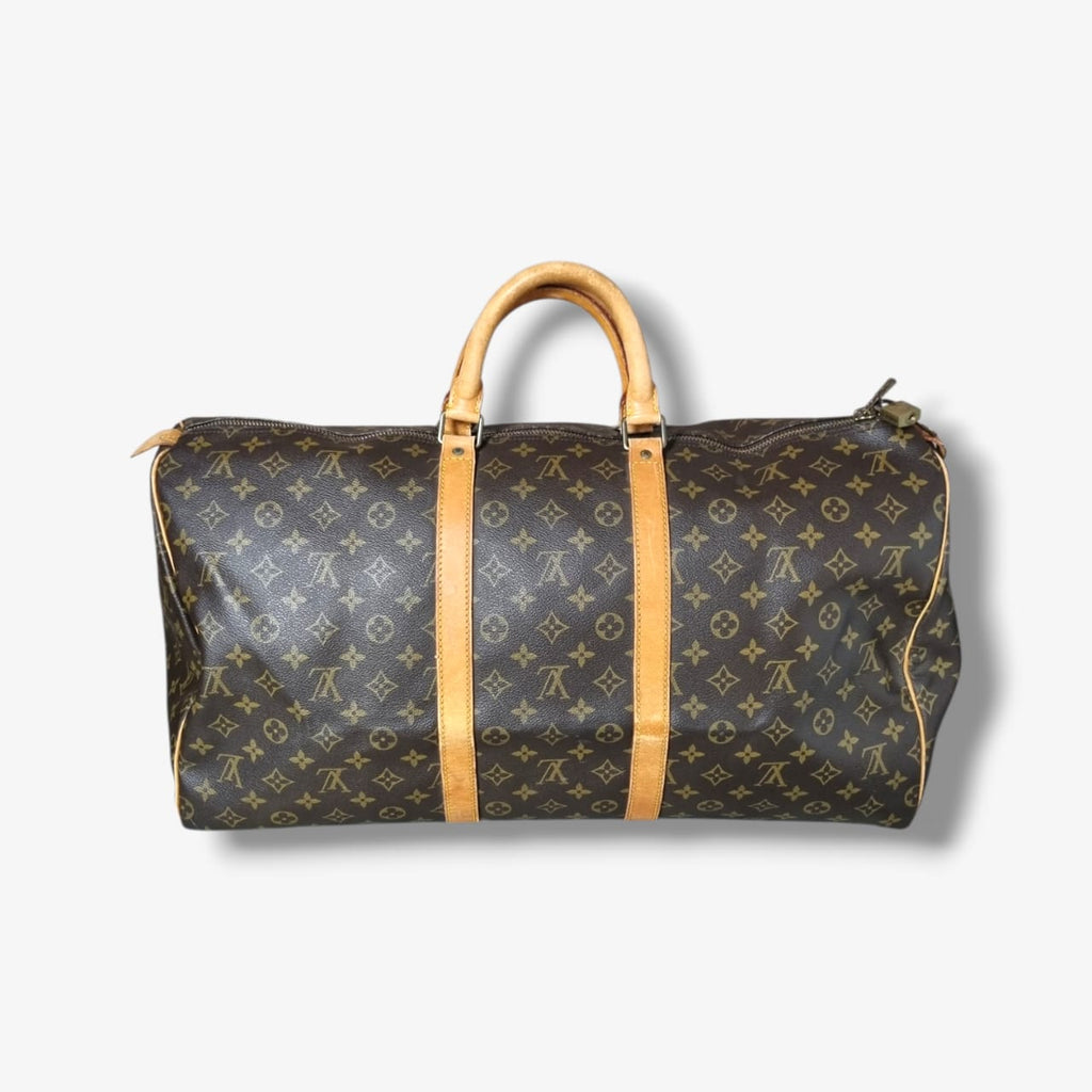 Louis Vuitton Keepall 55 Monogram vintage sac de voyage toile marron cuir patiné