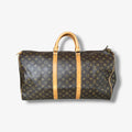 Louis Vuitton Keepall 55 Monogram vintage sac de voyage toile marron cuir patiné