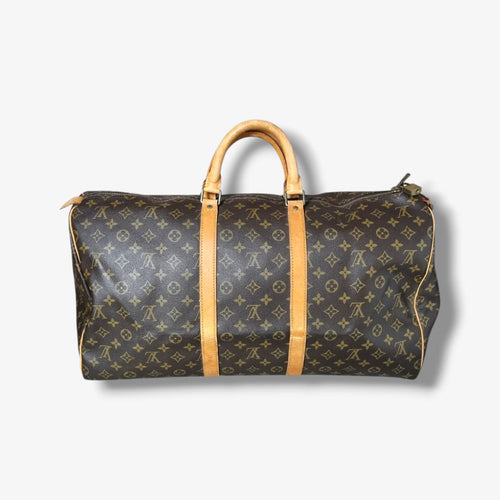 Louis Vuitton Keepall 55 Monogram vintage sac de voyage toile marron cuir patiné