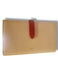 Portefeuille CELINE Large Flap cuir grainé beige avec fermeture rouge