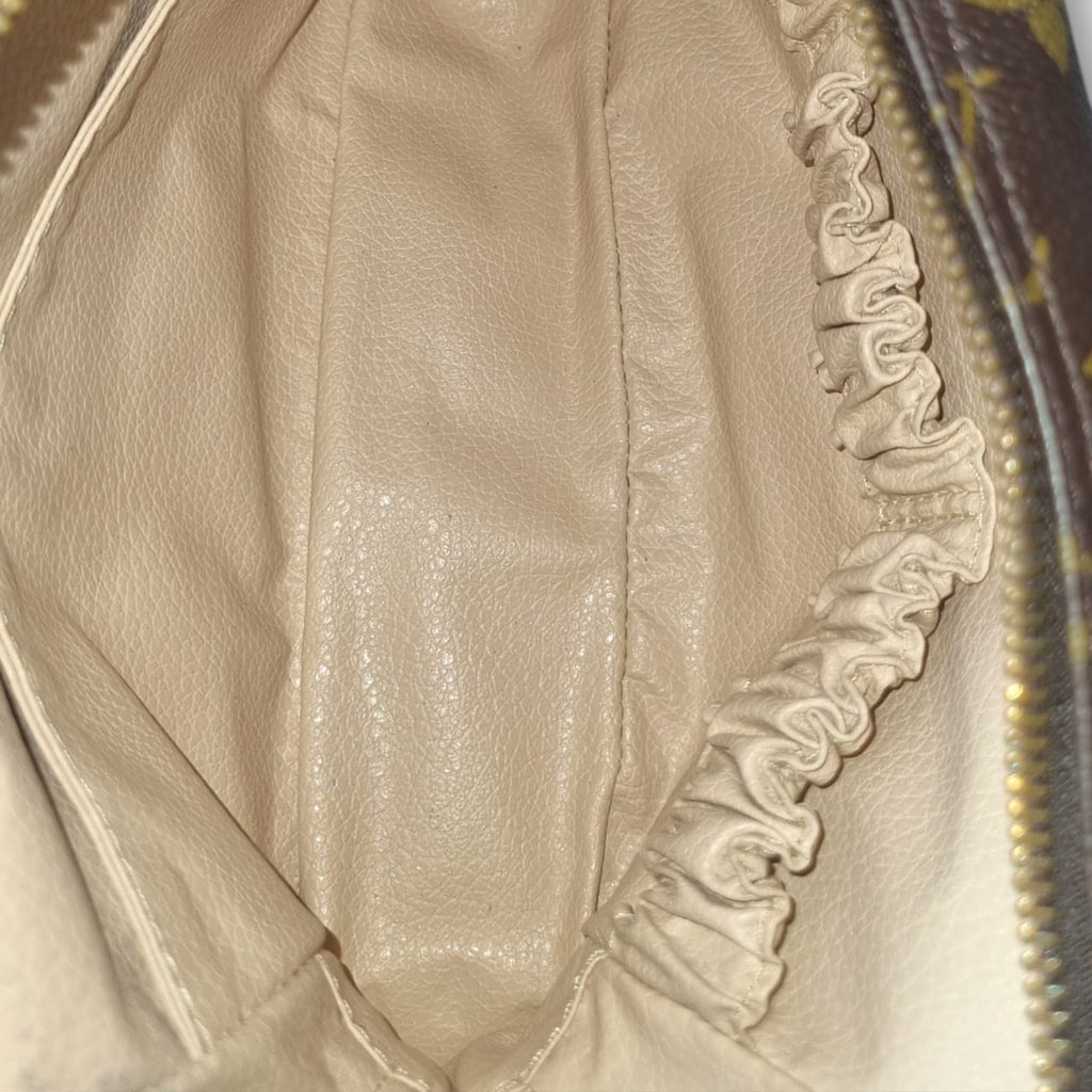 Louis Vuitton Trousse de toilette