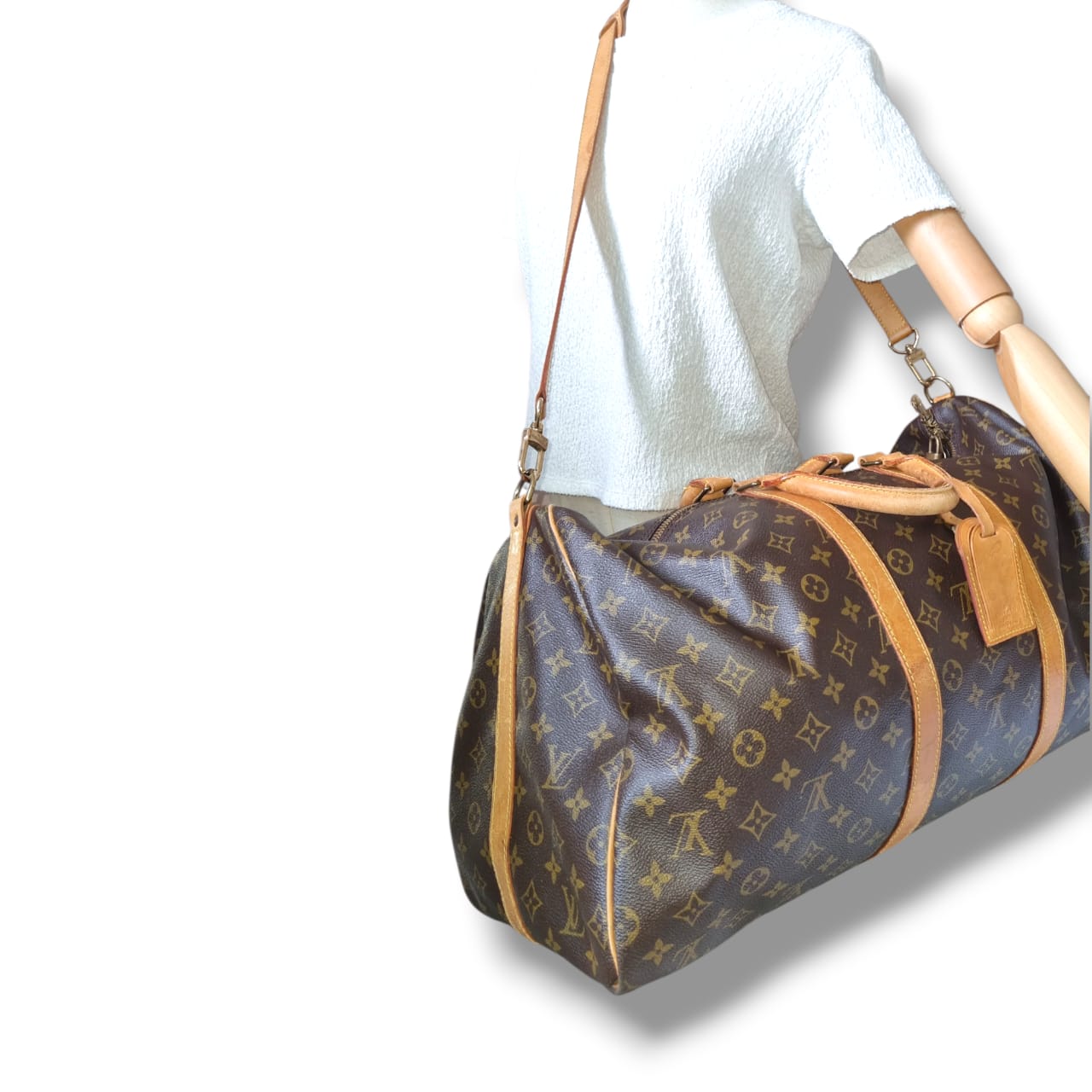 Louis Vuitton Keepall 55 Bandoulière Monogram cadenas clés